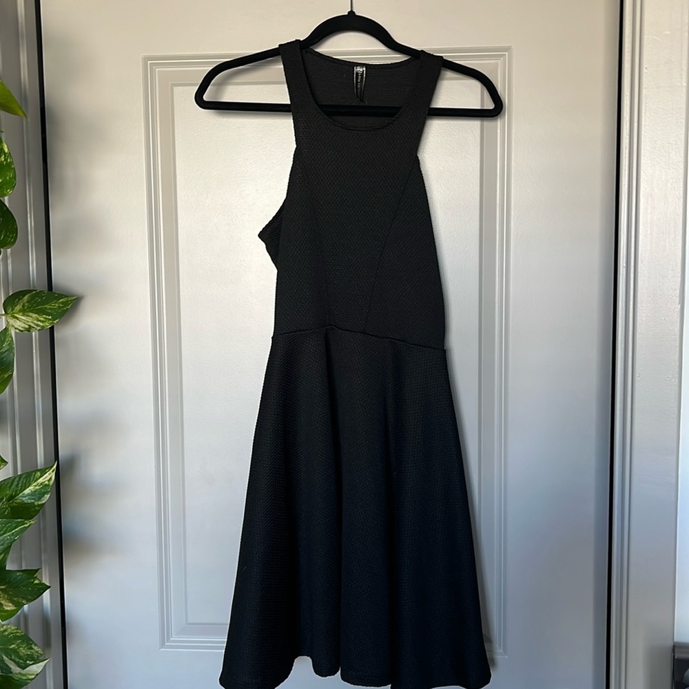 Poof Couture black dress, size M.